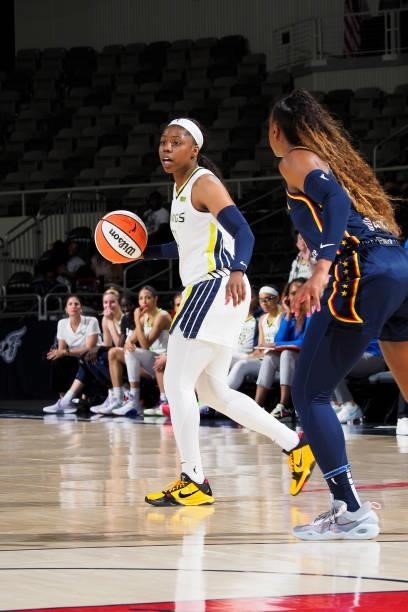 Arike Ogunbowale of the Dallas Wings handles the ball against the Indiana Fever on June 24, 2021 at Indiana Farmers Coliseum in Indianapolis,...