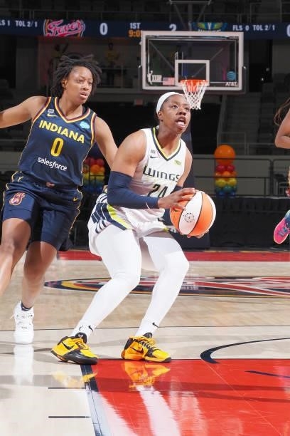 Arike Ogunbowale of the Dallas Wings looks to shoot the ball against the Indiana Fever on June 24, 2021 at Indiana Farmers Coliseum in Indianapolis,...