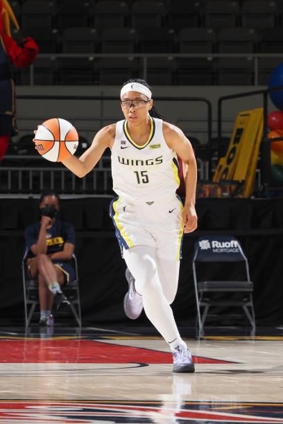 Allisha Gray of the Dallas Wings dribbles the ball against the Indiana Fever on June 24, 2021 at Indiana Farmers Coliseum in Indianapolis, Indiana....