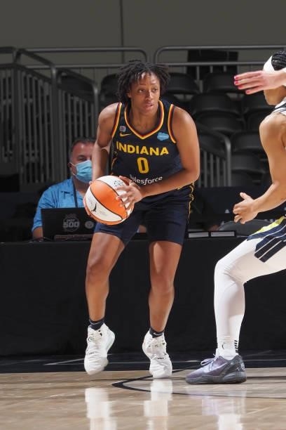 Kelsey Mitchell of the Indiana Fever handles the ball against the Dallas Wings on June 24, 2021 at Indiana Farmers Coliseum in Indianapolis, Indiana....