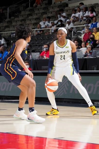 Kelsey Mitchell of the Indiana Fever plays defense on Arike Ogunbowale of the Dallas Wings on June 24, 2021 at Indiana Farmers Coliseum in...