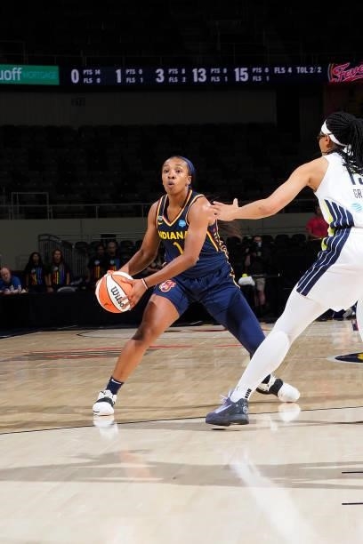 Aaliyah Wilson of the Indiana Fever handles the ball against the Dallas Wings on June 24, 2021 at Indiana Farmers Coliseum in Indianapolis, Indiana....