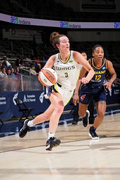 Marina Mabrey of the Dallas Wings dribbles the ball against the Indiana Fever on June 24, 2021 at Indiana Farmers Coliseum in Indianapolis, Indiana....