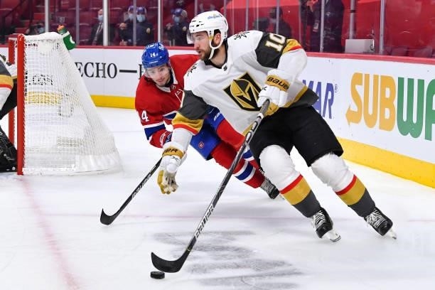 June 24: Nicolas Roy of the Vegas Golden Knights skates with the puck followed by Nick Suzuki of the Montreal Canadiens in Game Six of the Stanley...