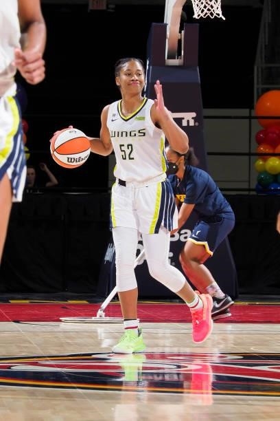 Tyasha Harris of the Dallas Wings dribbles the ball against the Indiana Fever on June 24, 2021 at Indiana Farmers Coliseum in Indianapolis, Indiana....