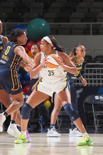 Charli Collier of the Dallas Wings handles the ball against the Indiana Fever on June 24, 2021 at Indiana Farmers Coliseum in Indianapolis, Indiana....