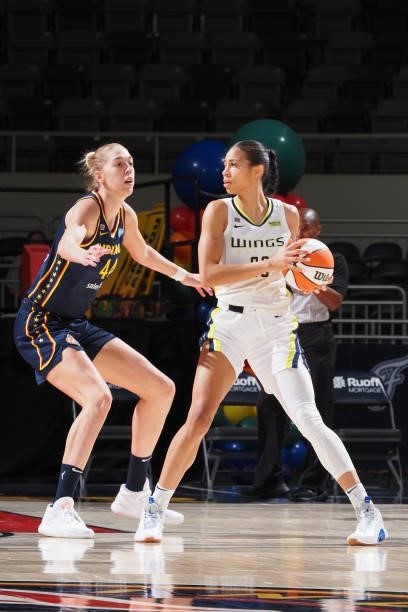 Bernadett Hatar of the Indiana Fever plays defense on Isabelle Harrison of the Dallas Wings on June 24, 2021 at Indiana Farmers Coliseum in...