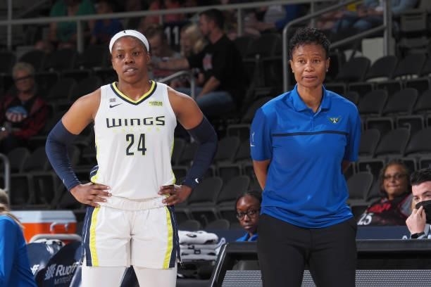 Head Coach Vickie Johnson and Arike Ogunbowale of the Dallas Wings look on during the game against the Indiana Fever on June 24, 2021 at Indiana...