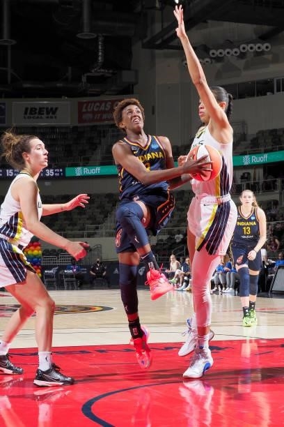 Danielle Robinson of the Indiana Fever drives to the basket against the Dallas Wings on June 24, 2021 at Indiana Farmers Coliseum in Indianapolis,...