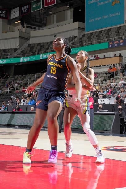Teaira McCowan of the Indiana Fever and Isabelle Harrison of the Dallas Wings look up on June 24, 2021 at Indiana Farmers Coliseum in Indianapolis,...