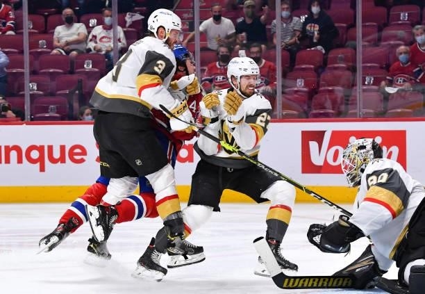 June 24: Brayden McNabb of the Vegas Golden Knights checks Nick Suzuki of the Montreal Canadiens in Game Six of the Stanley Cup Semifinals of the...