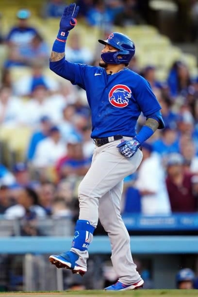 Javier Báez of the Chicago Cubs celebrates after hitting a home run during the game between the Chicago Cubs and the Los Angeles Dodgers at Dodgers...