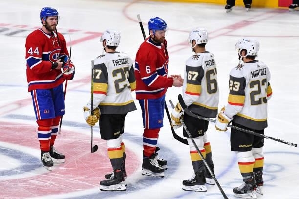 June 24: Montreal Canadiens players shake hands with Vegas Golden Knights players after defeating them in Game Six of the Stanley Cup Semifinals of...