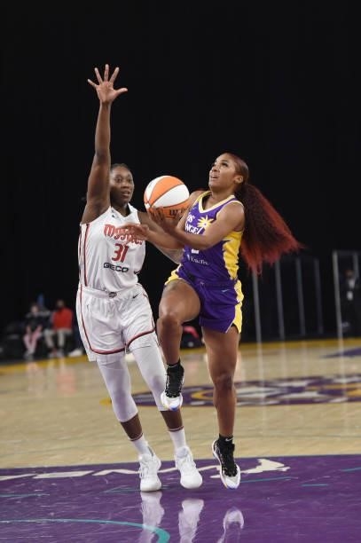 Te'a Cooper of the Los Angeles Sparks drives to the basket against the Washington Mystics on June 24, 2021 at the Los Angeles Convention Center in...
