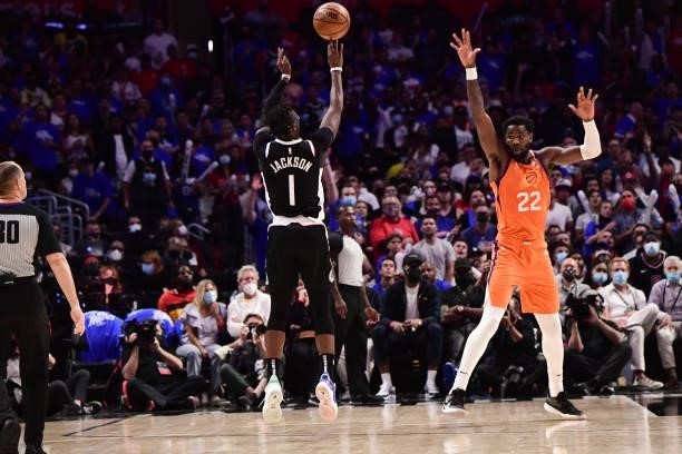 Reggie Jackson of the LA Clippers shoots a three point basket during the game against the Phoenix Suns during Game 3 of the Western Conference Finals...