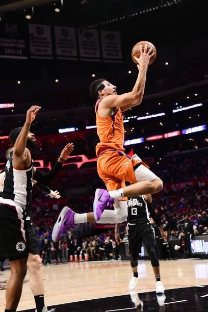 Devin Booker of the Phoenix Suns drives to the basket during the game against the LA Clippers during Game 3 of the Western Conference Finals of the...