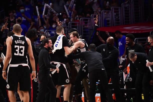 The LA Clippers help up Luke Kennard of the LA Clippers during the game against the Phoenix Suns during Game 3 of the Western Conference Finals of...
