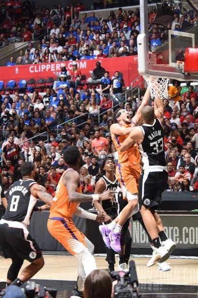 Devin Booker of the Phoenix Suns shoots the ball against the LA Clippers during Game 3 of the Western Conference Finals of the 2021 NBA Playoffs on...
