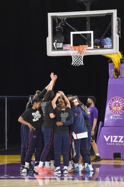 The Washington Mystics huddle up before the game against the Los Angeles Sparks on June 24, 2021 at the Los Angeles Convention Center in Los Angeles,...