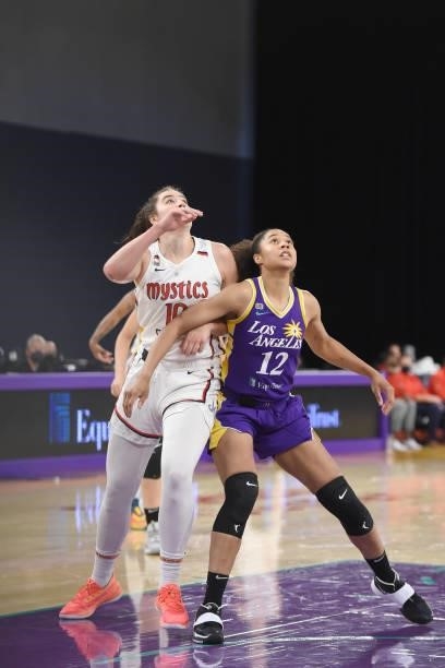 Megan Gustafson of the Washington Mystics and Nia Coffey of the Los Angeles Sparks look up during the game on June 24, 2021 at the Los Angeles...