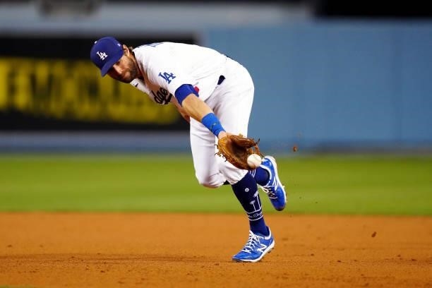 Chris Taylor of the Los Angeles Dodgers fields a ground ball during the game between the Chicago Cubs and the Los Angeles Dodgers at Dodgers Stadium...