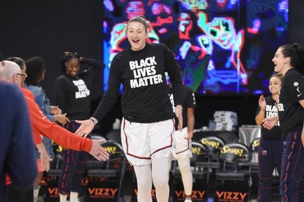 Theresa Plaisance of the Washington Mystics high fives her teammates before the game against the Los Angeles Sparks on June 24, 2021 at the Los...