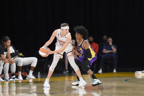 Brittney Sykes of the Los Angeles Sparks plays defense on Sydney Wiese of the Washington Mystics on June 24, 2021 at the Los Angeles Convention...