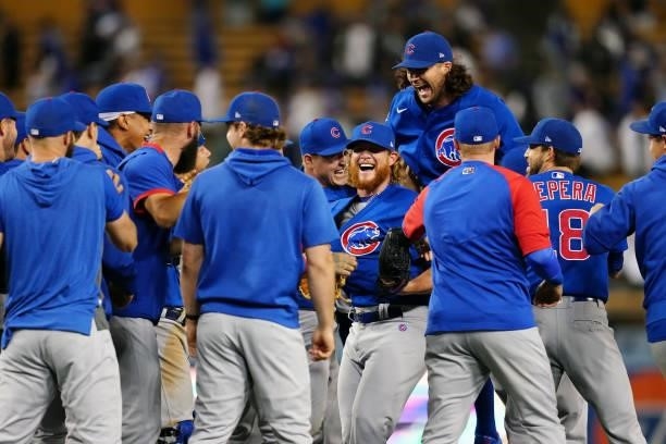Members of the Chicago Cubs celebrate after throwing a combined no hitter and defeating the Los Angeles Dodgers 4-0 at Dodgers Stadium on Thursday,...