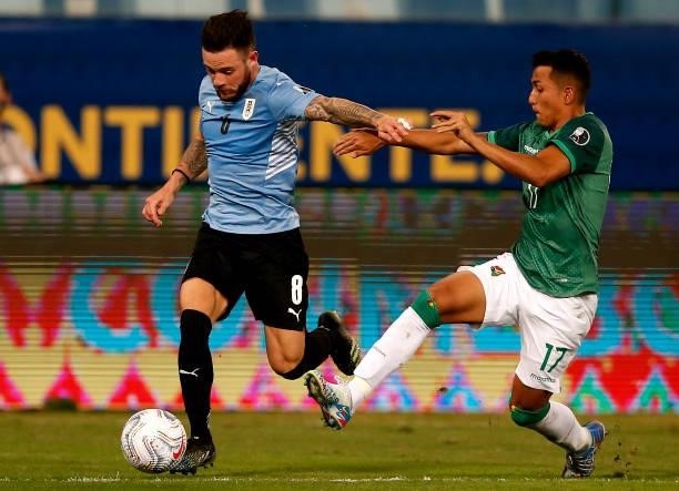 Nahitan Nandez of Uruguay competes for the ball with Roberto Carlos Fernandez of Bolivia ,during the match between Bolivia and Uruguay as part of...