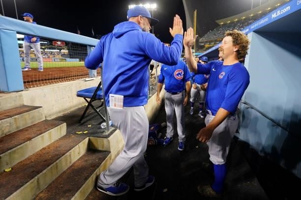 Andrew Chafin of the Chicago Cubs celebrates with Manager David Ross after throwing a combined no hitter against the Los Angeles Dodgers at Dodgers...
