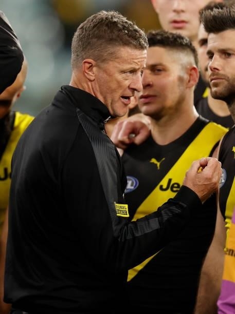 Damien Hardwick, Senior Coach of the Tigers addresses his players during the 2021 AFL Round 15 match between the Richmond Tigers and the St Kilda...