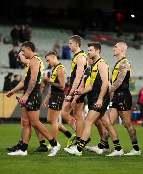 The Tigers look dejected after a loss during the 2021 AFL Round 15 match between the Richmond Tigers and the St Kilda Saints at the Melbourne Cricket...