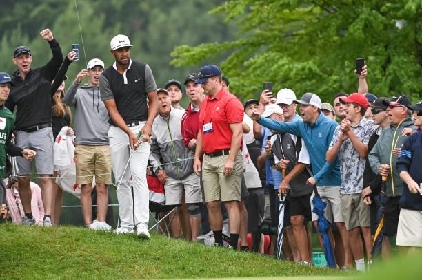 Tony Finau chips in on the second green during the second round of the Travelers Championship at TPC River Highlands on June 25, 2021 in Cromwell,...
