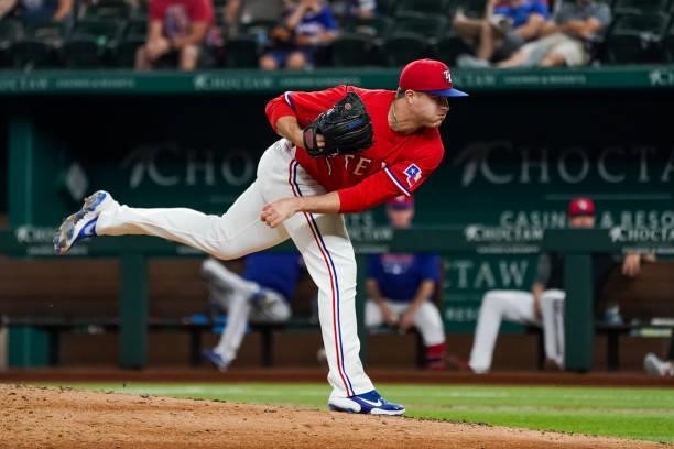 John King of the Texas Rangers pitches during the top of the 6th inning in the game against the Kansas City Royals at Globe Life Field on June 25,...