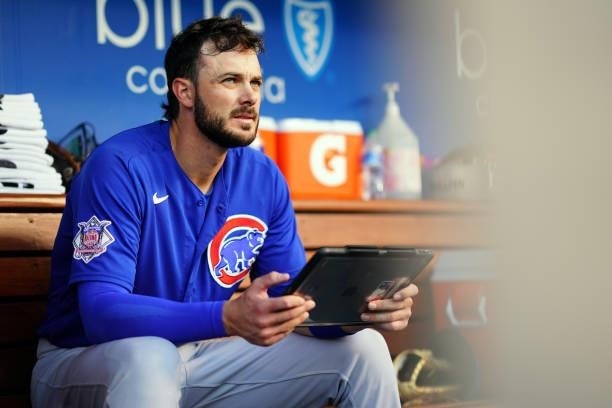 Kris Bryant of the Chicago Cubs uses a tablet in the dugout during the game between the Chicago Cubs and the Los Angeles Dodgers at Dodgers Stadium...