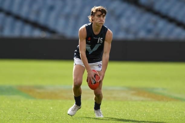 Luke Teal of Vic Metro takes possession of the ball during the U17 Championships match between Vic Country and Vic Metro at GMHBA Stadium on June 26,...