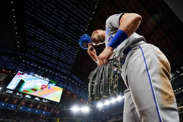 Hunter Dozier of the Kansas City Royals leaves the dugout in the 7th inning of he game against the Texas Rangers at Globe Life Field on June 25, 2021...