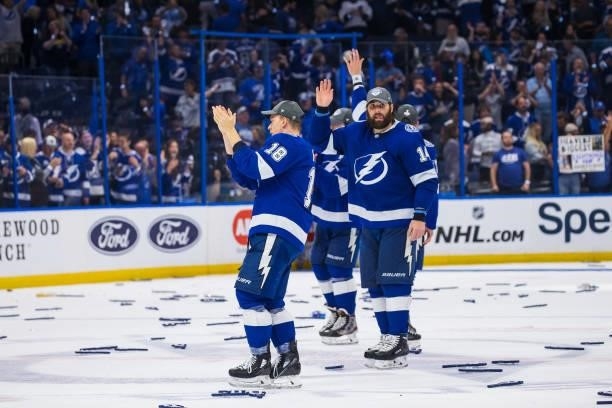 Ondrej Palat and Pat Maroon of the Tampa Bay Lightning celebrate the game and series win against the New York Islanders in Game Seven of the Stanley...