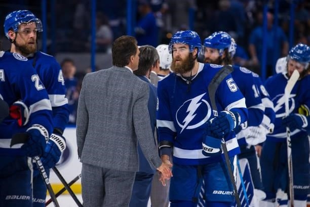 David Savard of the Tampa Bay Lightning shakes hands with the New York Islanders after the series win in Game Seven of the Stanley Cup Semifinals of...