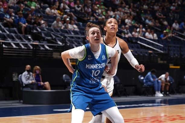 Jessica Shepard of the Minnesota Lynx and A'ja Wilson of the Las Vegas Aces fight for position during the game on June 25, 2021 at Target Center in...