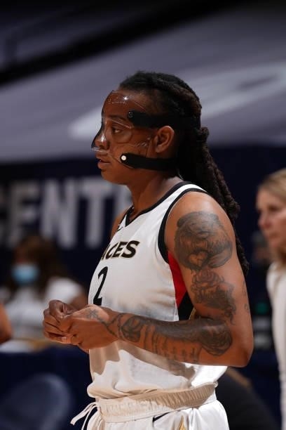 Riquna Williams of the Las Vegas Aces looks on during the game against the Minnesota Lynx on June 25, 2021 at Target Center in Minneapolis,...