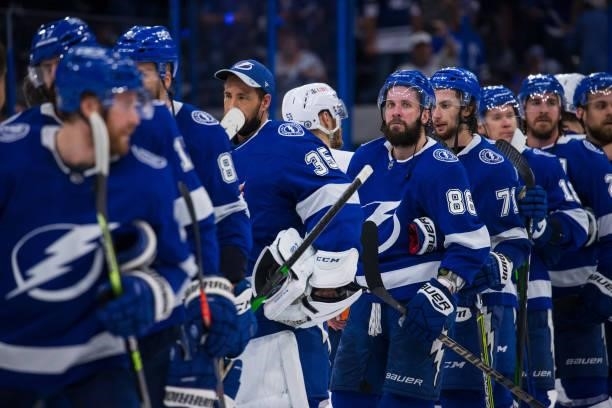 The Tampa Bay Lightning shakes hands the New York Islanders after the series win in Game Seven of the Stanley Cup Semifinals of the 2021 Stanley Cup...
