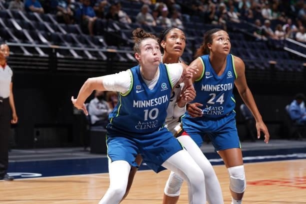Jessica Shepard of the Minnesota Lynx and A'ja Wilson of the Las Vegas Aces fight for position during the game on June 25, 2021 at Target Center in...