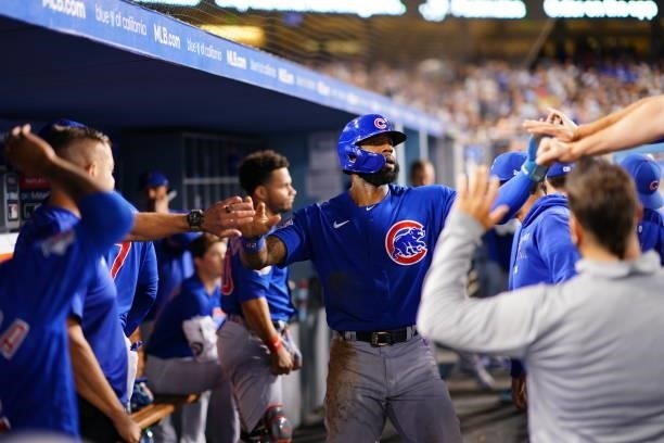 Jason Heyward of the Chicago Cubs celebrates with teammates after tying the game during the game between the Chicago Cubs and the Los Angeles Dodgers...