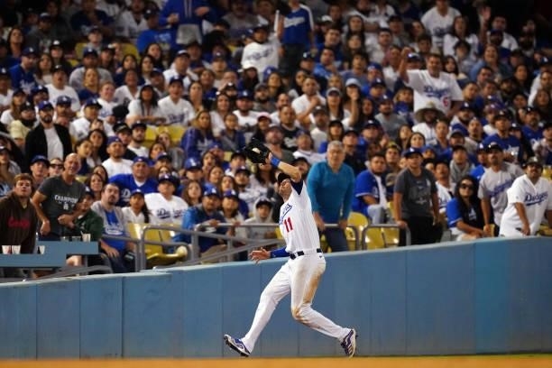 Pollock of the Los Angeles Dodgers catches the ball during the game between the Chicago Cubs and the Los Angeles Dodgers at Dodgers Stadium on...