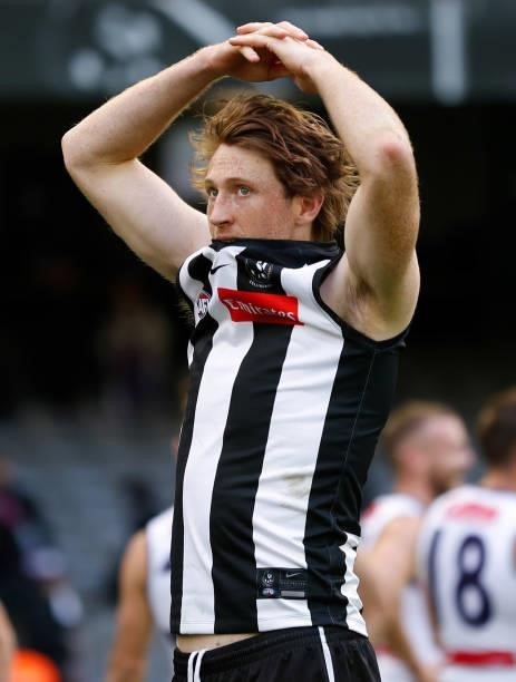 Nathan Murphy of the Magpies looks dejected after a loss during the 2021 AFL Round 15 match between the Collingwood Magpies and the Fremantle Dockers...