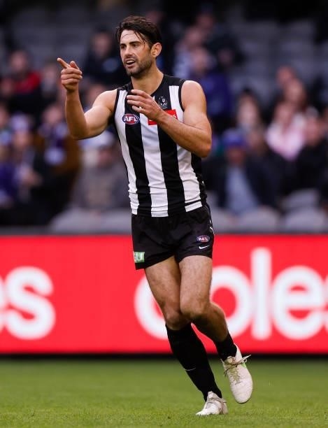 Brodie Grundy of the Magpies celebrates a goal during the 2021 AFL Round 15 match between the Collingwood Magpies and the Fremantle Dockers at Marvel...