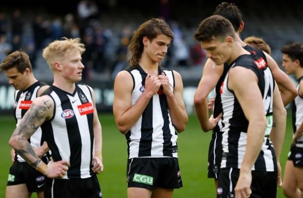 Caleb Poulter of the Magpies looks dejected after a loss during the 2021 AFL Round 15 match between the Collingwood Magpies and the Fremantle Dockers...