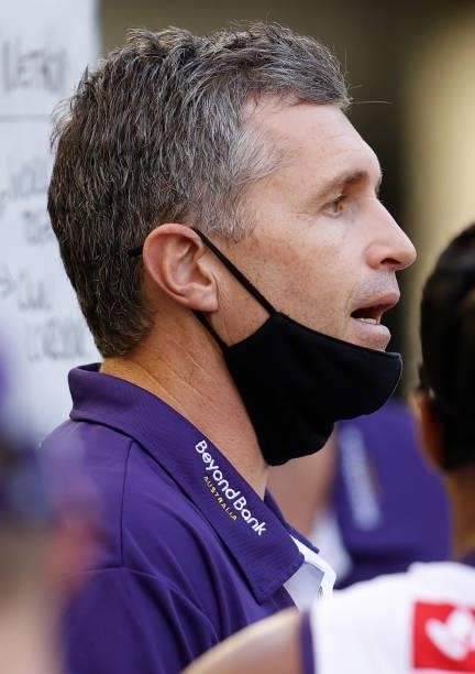 Justin Longmuir, Senior Coach of the Dockers addresses his players during the 2021 AFL Round 15 match between the Collingwood Magpies and the...