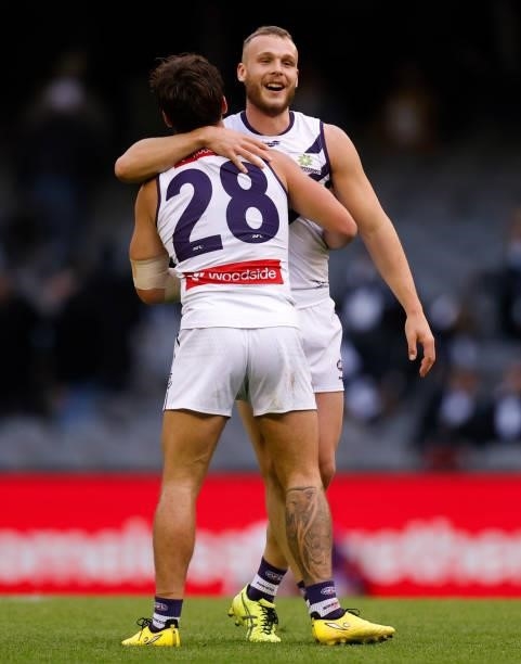 Lachie Schultz and Brett Bewley of the Dockers celebrate during the 2021 AFL Round 15 match between the Collingwood Magpies and the Fremantle Dockers...
